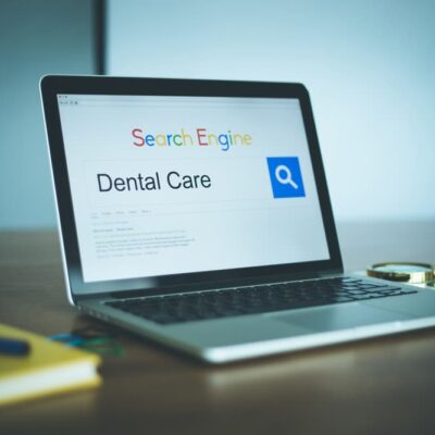 Laptop computer showing SEO search results for dentists